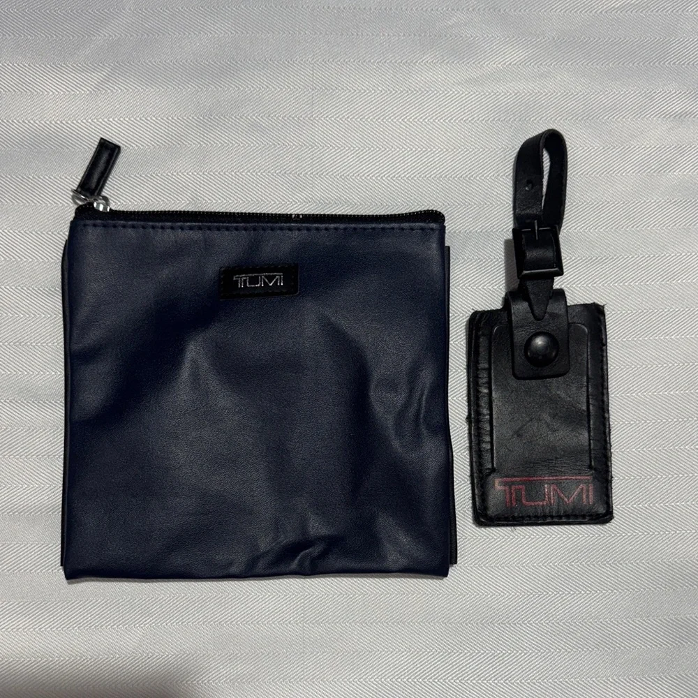 Tumi Navy Toiletry Bag with Black Leather Luggage Tag